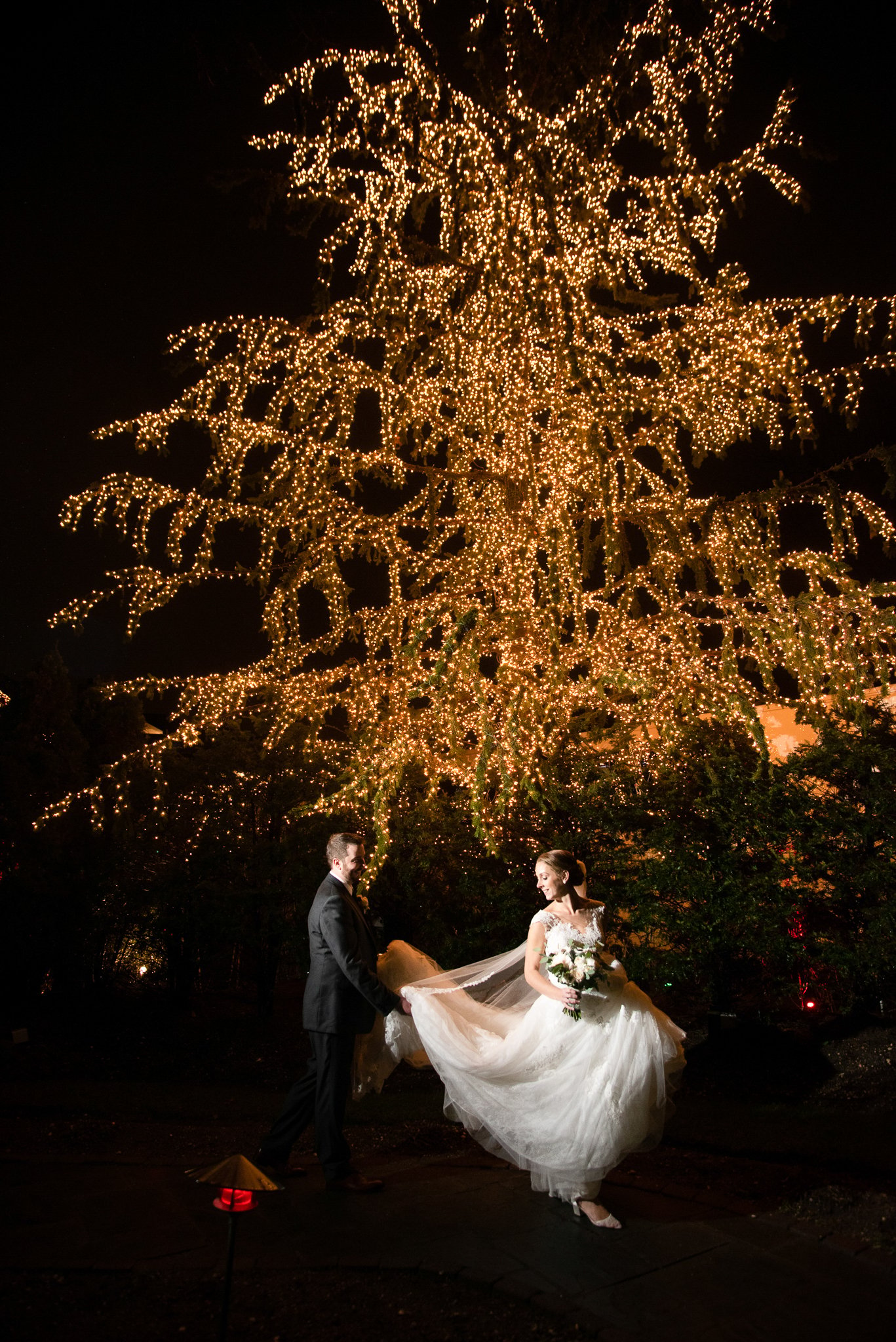 Unique nighttime wedding photos at Fox Hollow | Garden Terrace Room