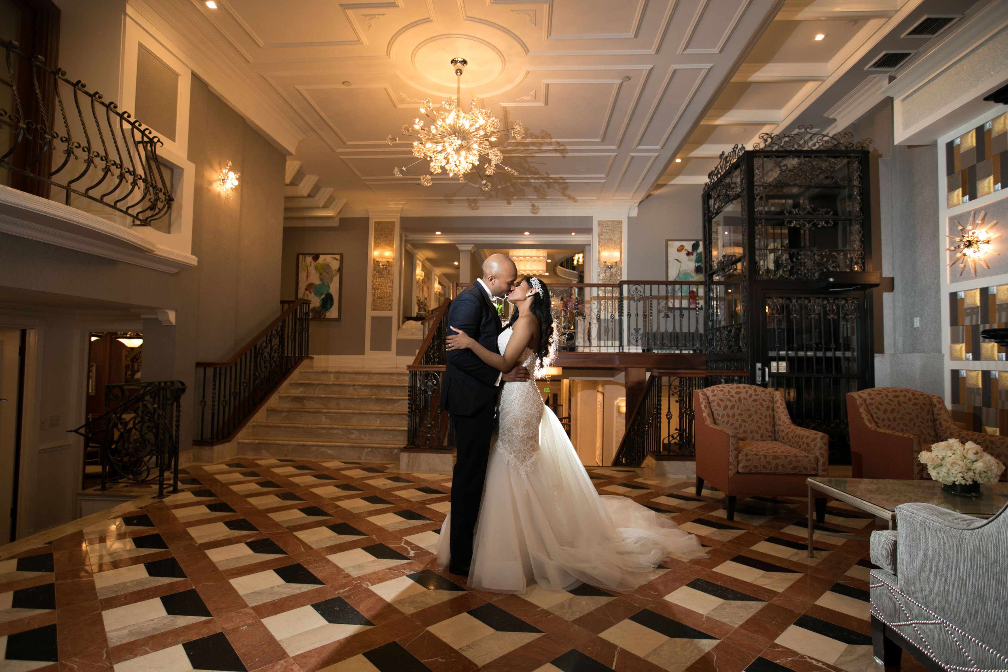 Jericho Terrace - Lobby Pictures - Bride and Groom Kissing