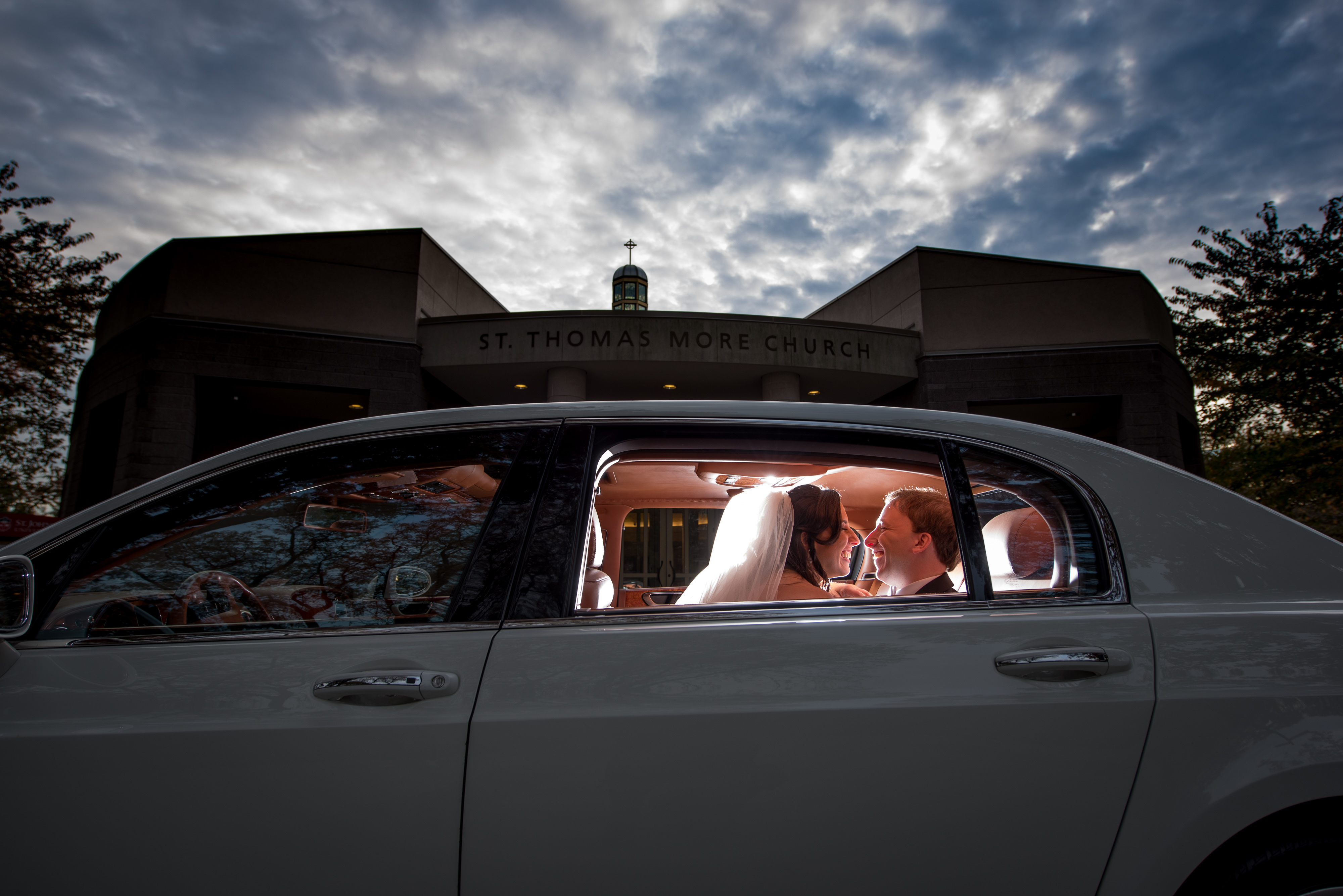 Bride and Groom in Limo | Lotus Wedding Photography