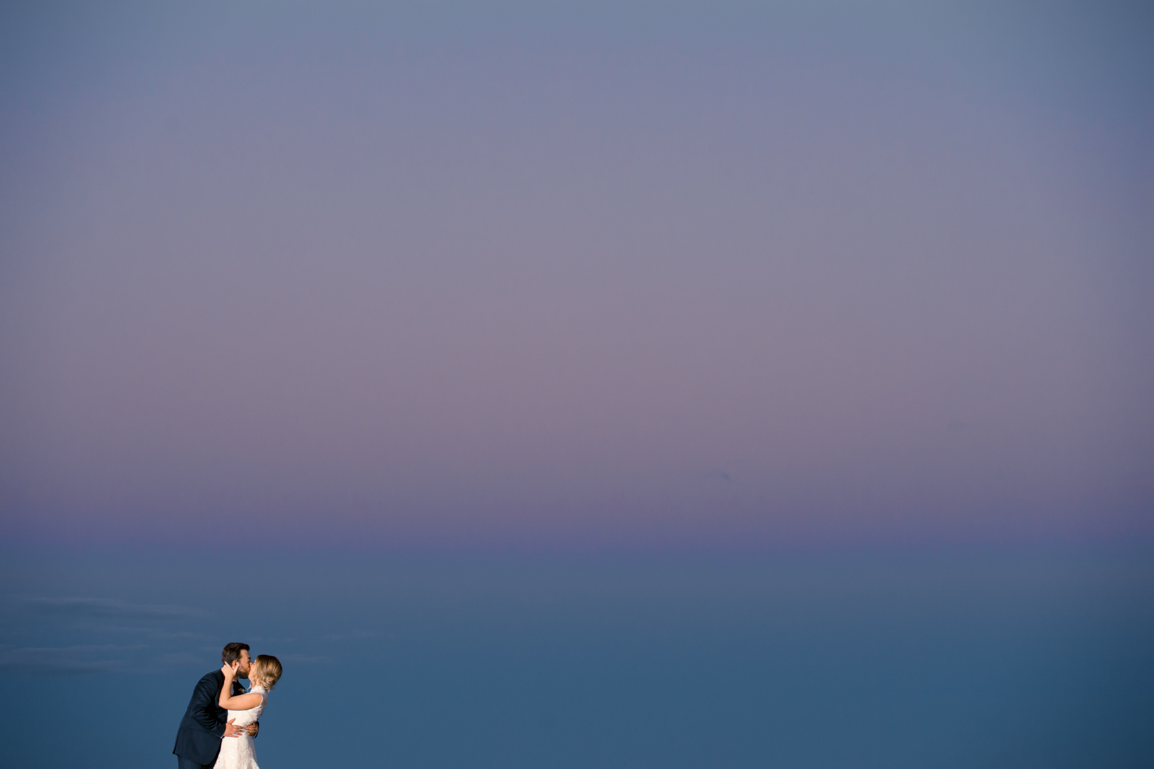 Stunning sunset wedding couple | Lotus Wedding Photography