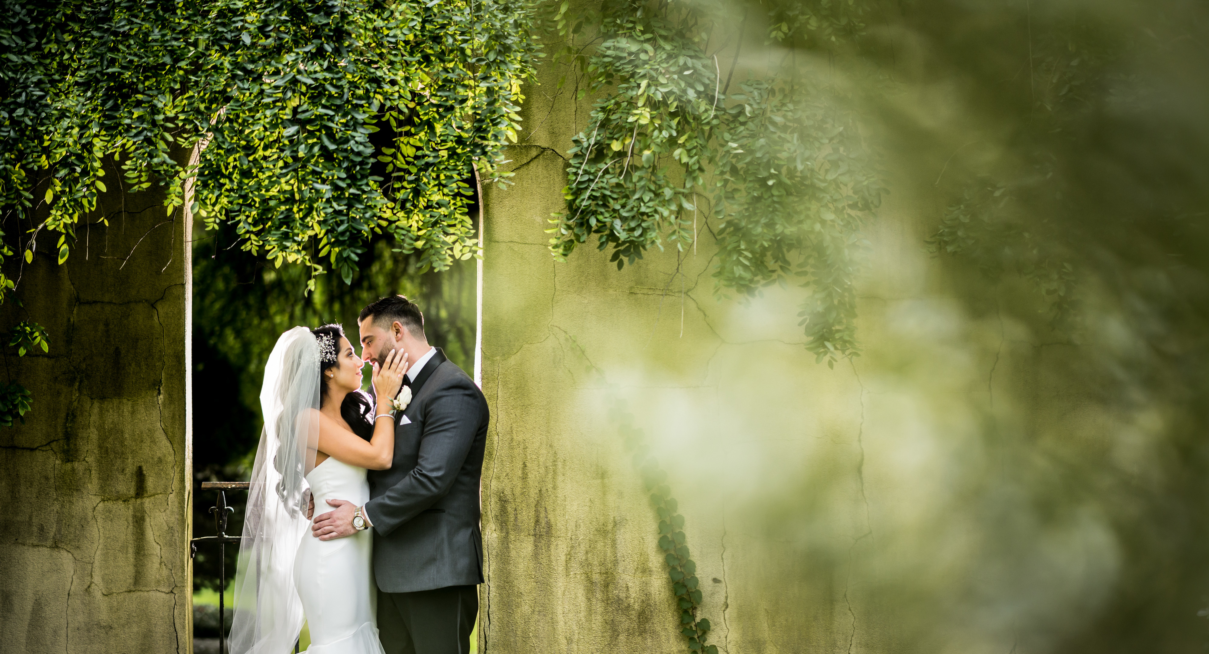 Couple kissing on their wedding day | Lotus Wedding Photography